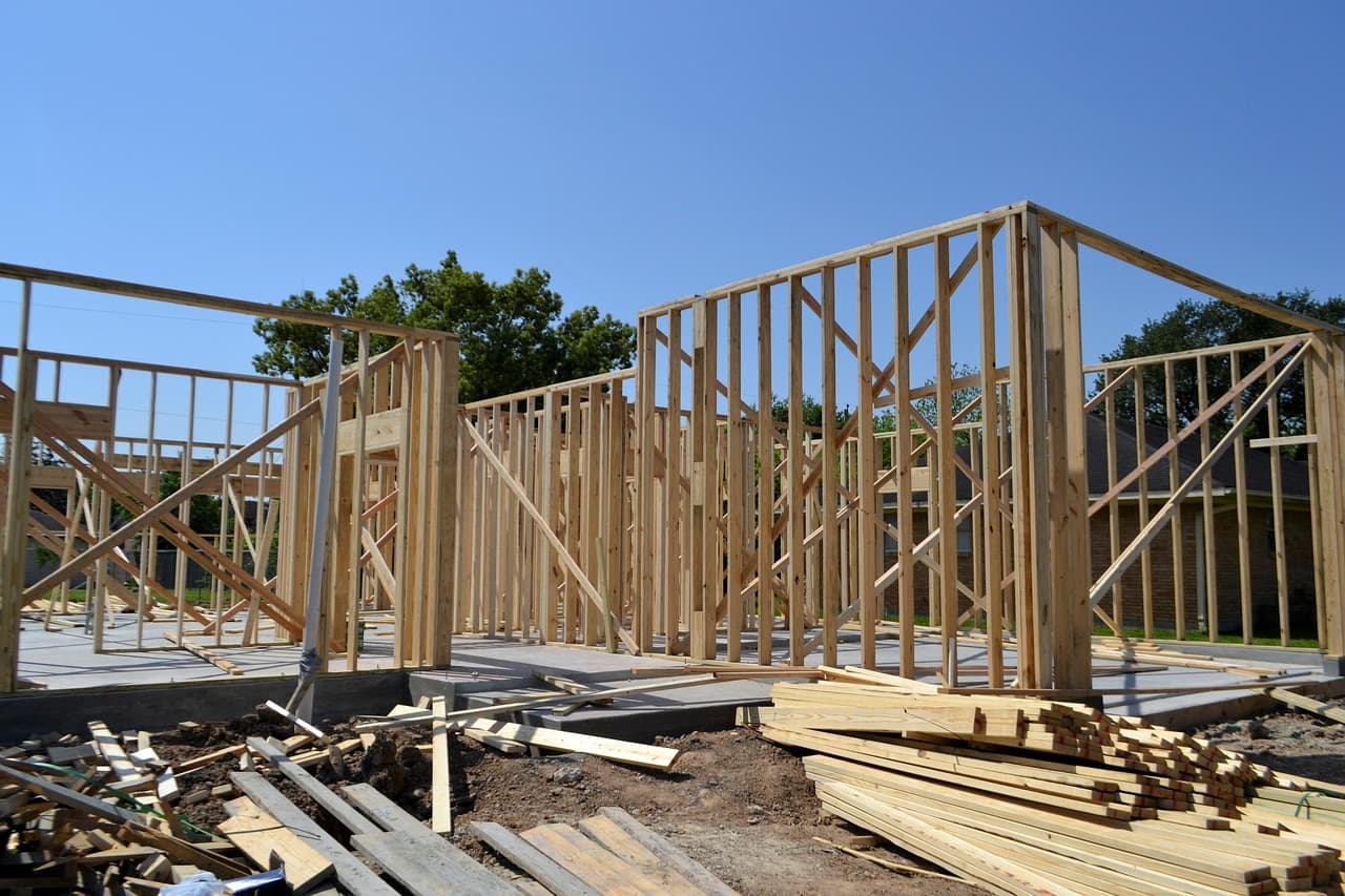 A house under construction with the framing exposed